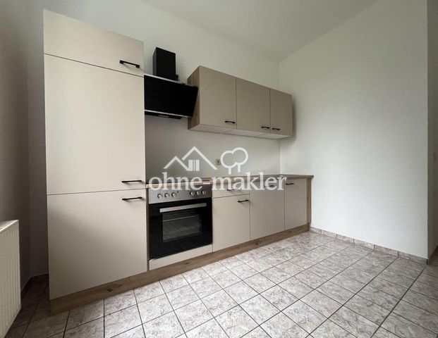 2-Raumwohnung im 1. OG mit Balkon und EBK - Foto 1
