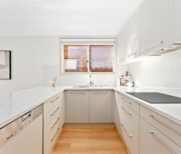 Modern Comfort Meets Everyday Convenience- Renovated Townhouse with... - Photo 6