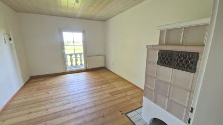 Idyllische 3-Zimmerwohnung mit Balkon und Kachelofen in Pastetten! - Foto 5