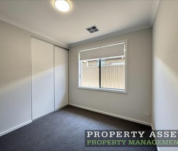 Stylish Brand-New Four Bedroom Home with Energy-Saving Solar - Photo 3