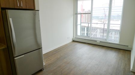 Bright 2 Bed Condo With Unbeatable Amenities | Heat & Water Included | In Suite Laundry - Photo 2