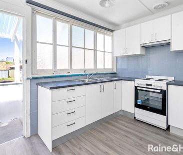 RENOVATED THREE BEDROOM HOME, MINUTES AWAY FROM BELMONT CITY CENTRE - Photo 1