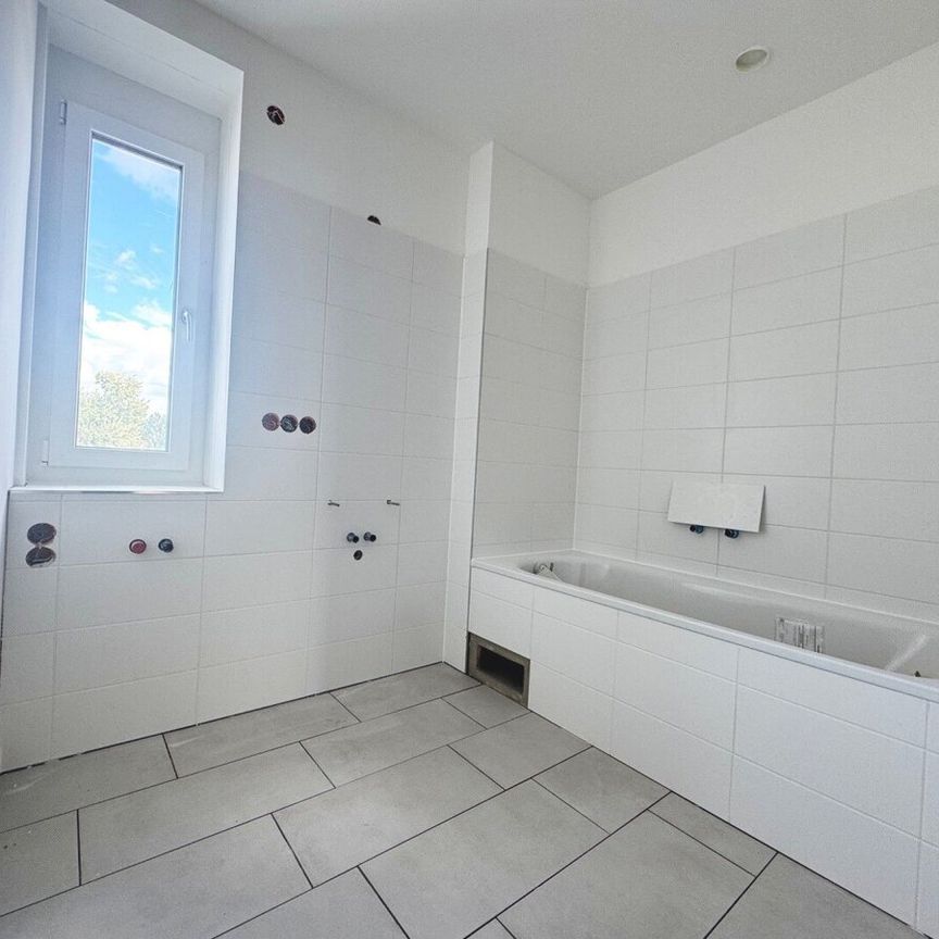 Erstbezug "ein viertel grün" – hochwertige Neubauwohnung mit Balkon & Tiefgarage - Photo 1