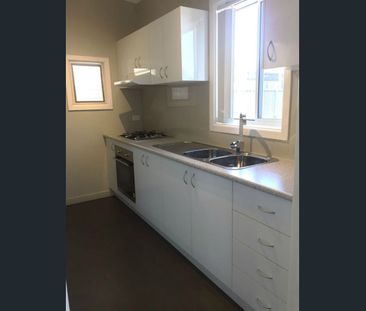 Front house with updated kitchen and bathroom - Photo 6