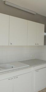 Appartement F3 ascenseur et place de parking - Photo 4