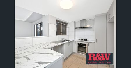 Bright & Modern 2-Bedroom Apartment in the Heart of Rockdale - Photo 3