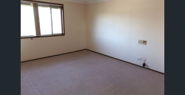 Convenient Living in Prime Moorebank Location! - Photo 1