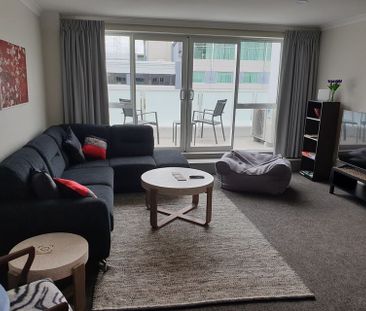 Fully Furnished Central City Apartment - Photo 1