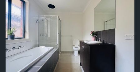 Modern Family Home with Dual Living Areas - Photo 3