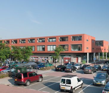 Ruime maisonnette boven winkelcentrum - Photo 4