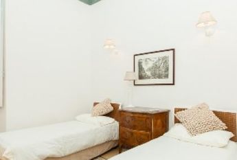 Center-Historic Jewish Quarter: Elegant apartment situated in beautiful Palazzo Nobiliare. Entrance, spacious living with original wood frescoed ceilings, large modern dining and kitchen, 4 bedrooms, 4 Baths, small terrace. #1527