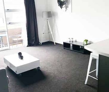 Split-Level City Fringe Living | 2 Bedrooms, 2 Bathrooms & Tandem P... - Photo 2