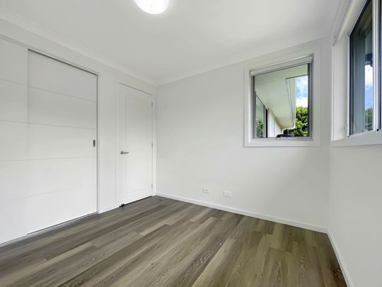 Modern, Light-Filled Home in a Prime Woy Woy Location - Photo 1