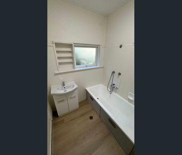 Unfurnished 2 Bedroom Duplex with Backyard - Photo 3