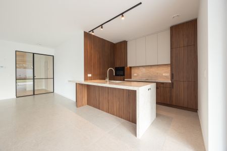 Prestigieus nieuwbouwappartement met ruime tuin en terras. - Photo 4