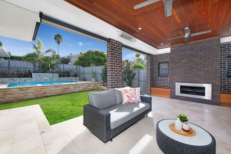 Spacious & Modern Family Home in Prime Roselands Location - Photo 4