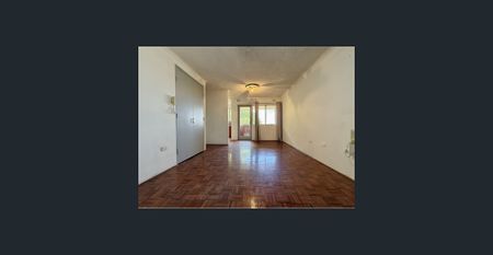 Top-Floor Gem with Modern Upgrades in Prime Liverpool Location - Photo 2