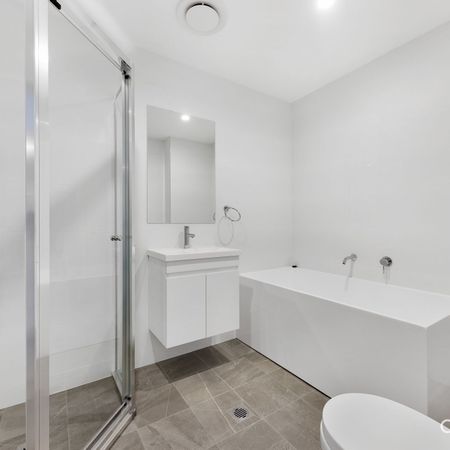 Modern two bedroom unit - 20% below market rent - Photo 4