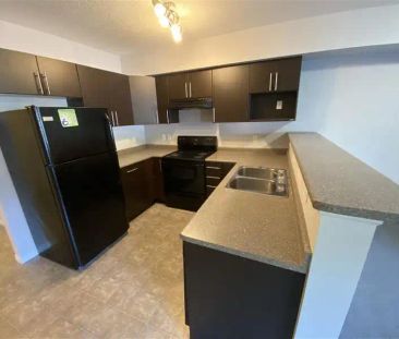 Norwood Village — 2 Bedroom + Den - Photo 2