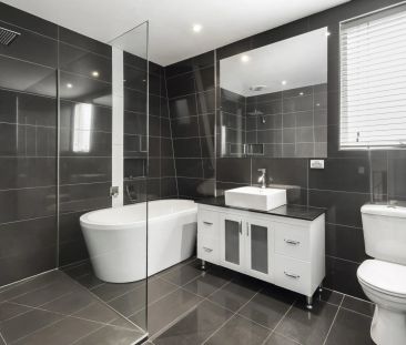 Stylish Family Home with Pool, Bar & Balcony in Prime Werribee Loca... - Photo 6