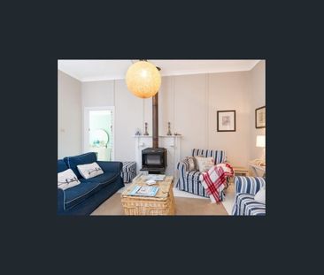 Charming Cottage with Modern Comforts - Photo 1