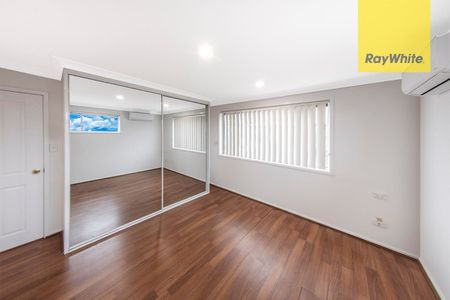 Stunningly Renovated 5-Bedroom Family Oasis with Pool and Garage! - Photo 2