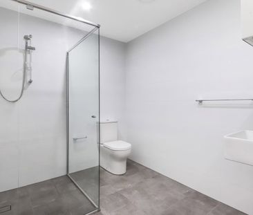 Modern Two Bedroom Unit - 20% Below Market Rent - Photo 4