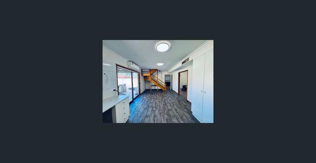 Spacious Two-Story Family Home with Modern Comforts and Prime Location - Photo 1