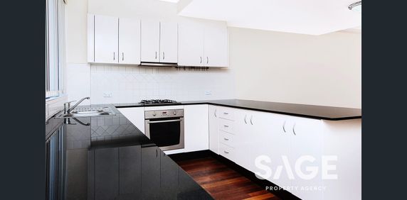 Versatile Townhouse Conveniently Positioned - Photo 2