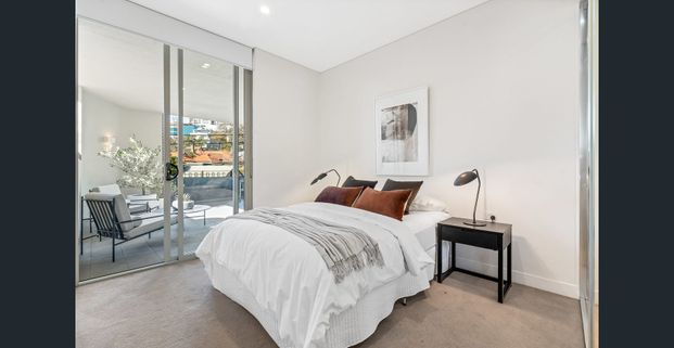 Centrally Located Boutique Residence with Spacious Home-Like Appeal - Photo 1