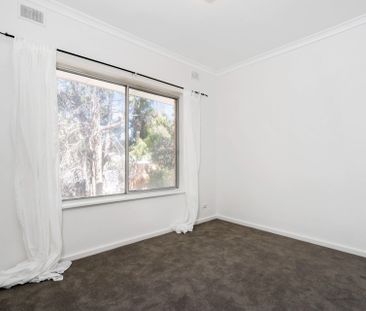 Refurbished unit in peaceful, well-connected suburb - Photo 6