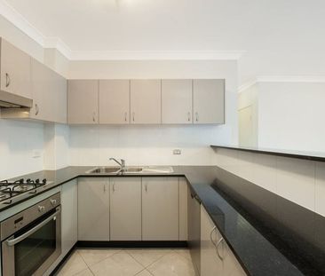 GROUND FLOOR APARTMENT WITH HUGE COURTYARD ADJOINS RESERVE - Photo 1