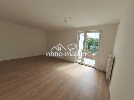 Traumhafte 3 Zimmer EG Wohnung mit Terasse + zwei Garagen zu vermieten - Foto 1