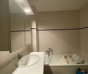 GELIJKVLOERSAPPARTEMENT MET TERRAS EN GARAGE IN HET CENTRUM VAN TIELT. - Foto 6