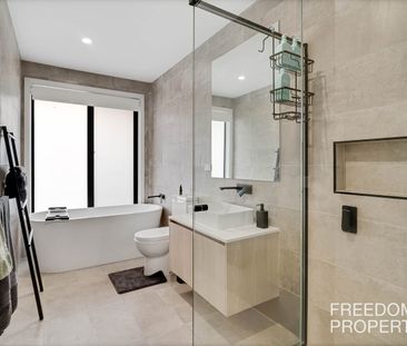 Spacious Near-New Family Townhouse with Premium Upgrades - Photo 2