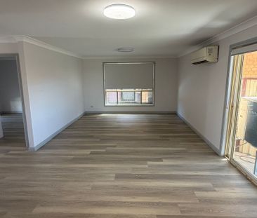 Spacious Five-Bedroom Family Home in a Convenient Location - Photo 1