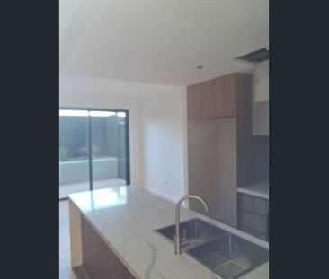 Luxury Four-Level Townhouse with Private Lift & Multiple Living Zones - Photo 2