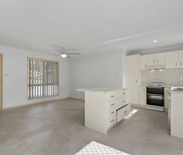 Comfortable Family Living with Updated Kitchen & Spacious Yard - Photo 4