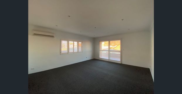 Modern Unit with Garage in Convenient Location - Photo 1