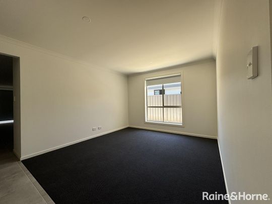 Four Bedroom Family Home with Two Living Areas. - Photo 1