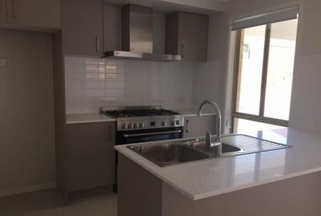 Four Bedroom Family Home with Multiple Living Areas! - Photo 3
