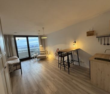Über den Dächern Münchens, möbliertes Apartment mit Südwest-Balkon - Photo 1