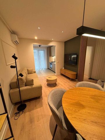 Închiriere apartament 2 camere + parcare subterană | Hils Titanium - Fotografie 2