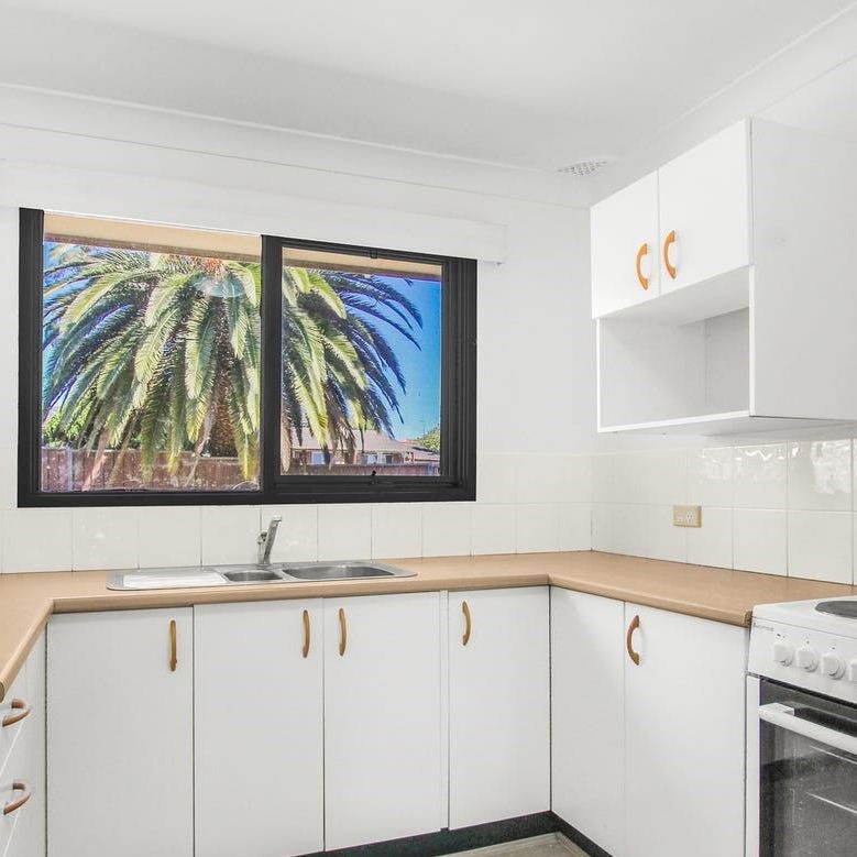 SPACIOUS FOUR BEDROOM FAMILY HOME - Photo 1