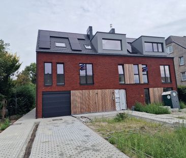 Nieuwbouwappartement op eerste verdieping met 2 slaapkamers, autostaanplaats en kelder - Photo 4