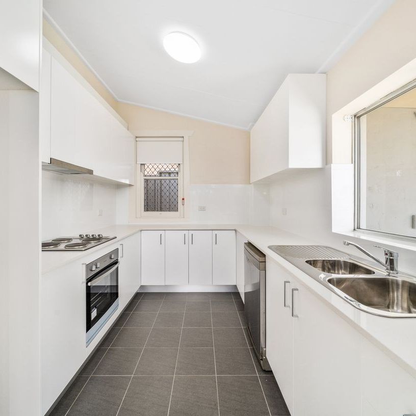 Elevated Freestanding Cottage with Generous Yard - Photo 1