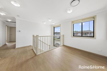 Contemporary Family Living in the Heart of Edmondson Park - Photo 4