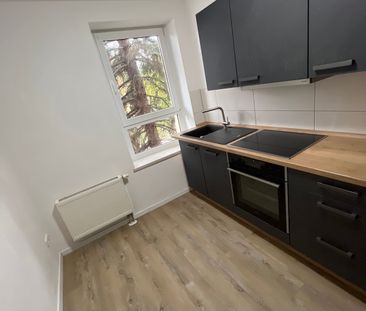 Praktische Singlewohnung mit moderner Einbauküche und Balkon! - Foto 5