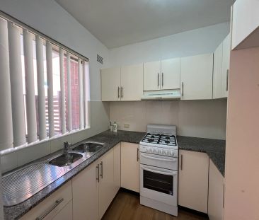 Peaceful parkside retreat with lock up garage & sunny aspect - Photo 2