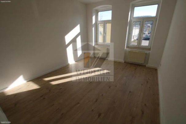 Sie suchen etwas Modernes? 2-Raum Wohnung mit neuer Einbauküche und neuem Boden! - Photo 1